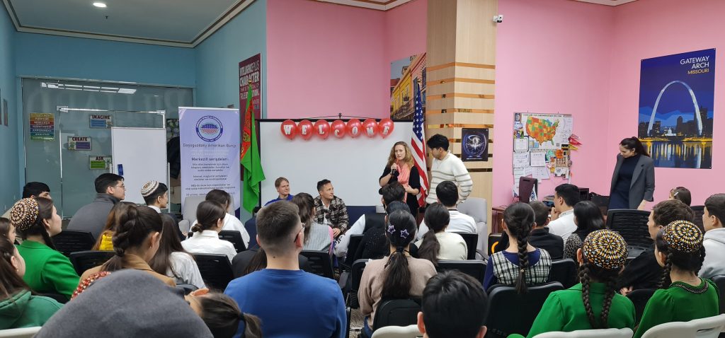 Aaron Young, Richie Robot Steighner, Kate Bass, and Dovran Shammyyev teaching a workshop at the American Corner in Dashoguz Turkmenistan